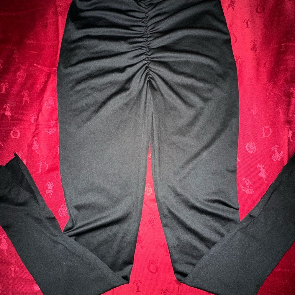 SHEIN black ruched slit hem flare leg pants.
